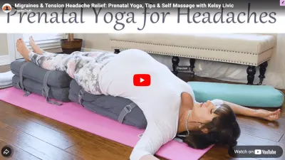 Woman practicing yoga for headache relief on a pink mat in a bright room.