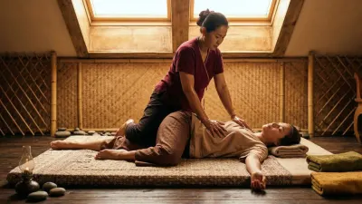 Woman receiving traditional Thai massage in a serene spa setting in Glasgow.